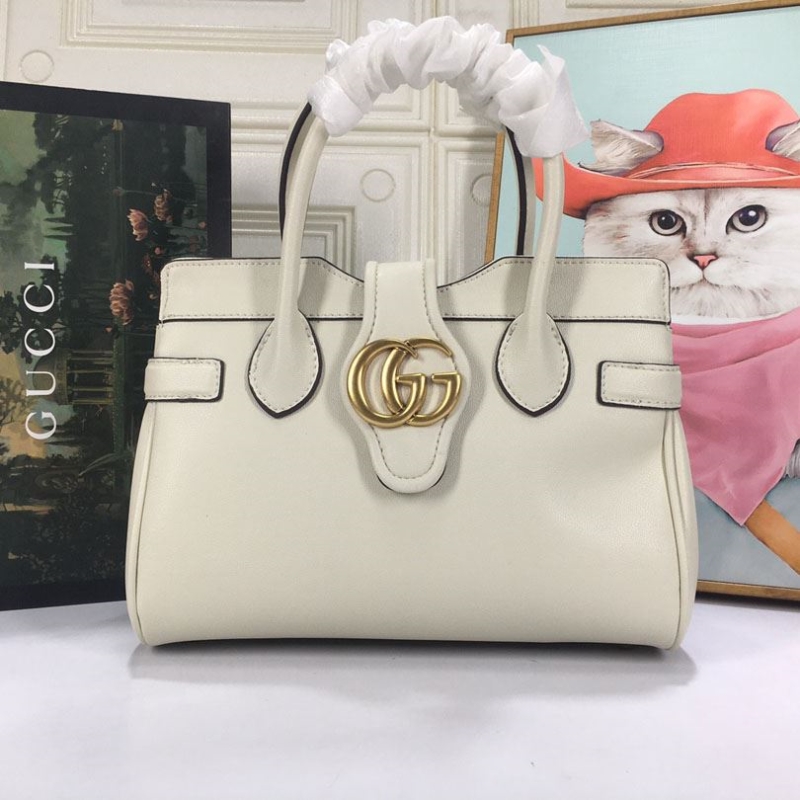 G*u*i shopping bags